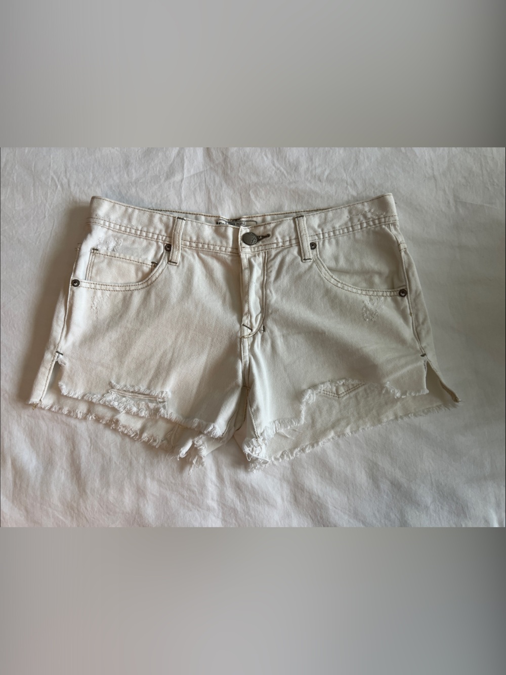Free People Off-White Distressed Denim Cutoff Shorts